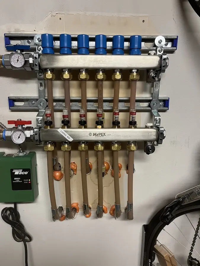 Plumber performing Gas Line Installation at a residential property in Batesville